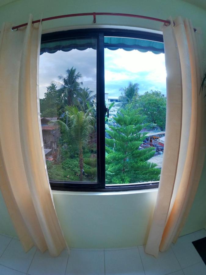 Antwet Backpacker'S Inn & Rooftop Bar Dumaguete City Bagian luar foto